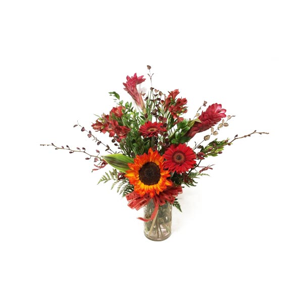 Cet arrangement de fleurs dans les teintes de rouge est idéale pour tout  occasion. Une présentation de WFN.